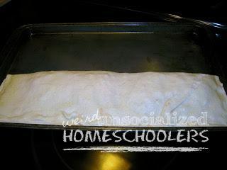 making homemade pizza rolls